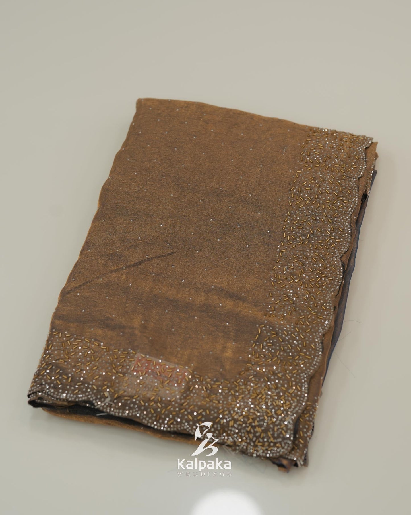 Grey and gold double shade Fancy Saree with Stone Work Border đ¸