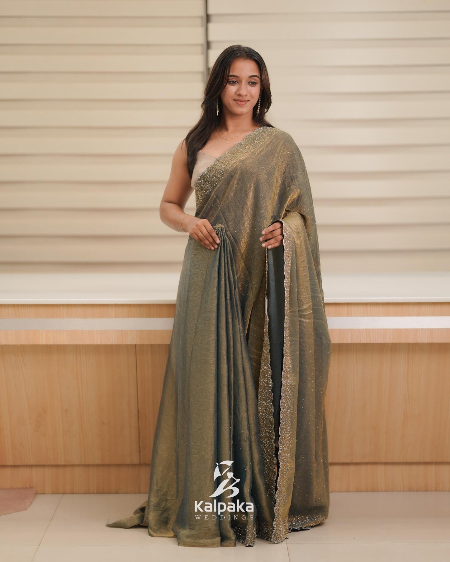 Teal blue and golden double shade Fancy Saree with Stone Work Border 🌸