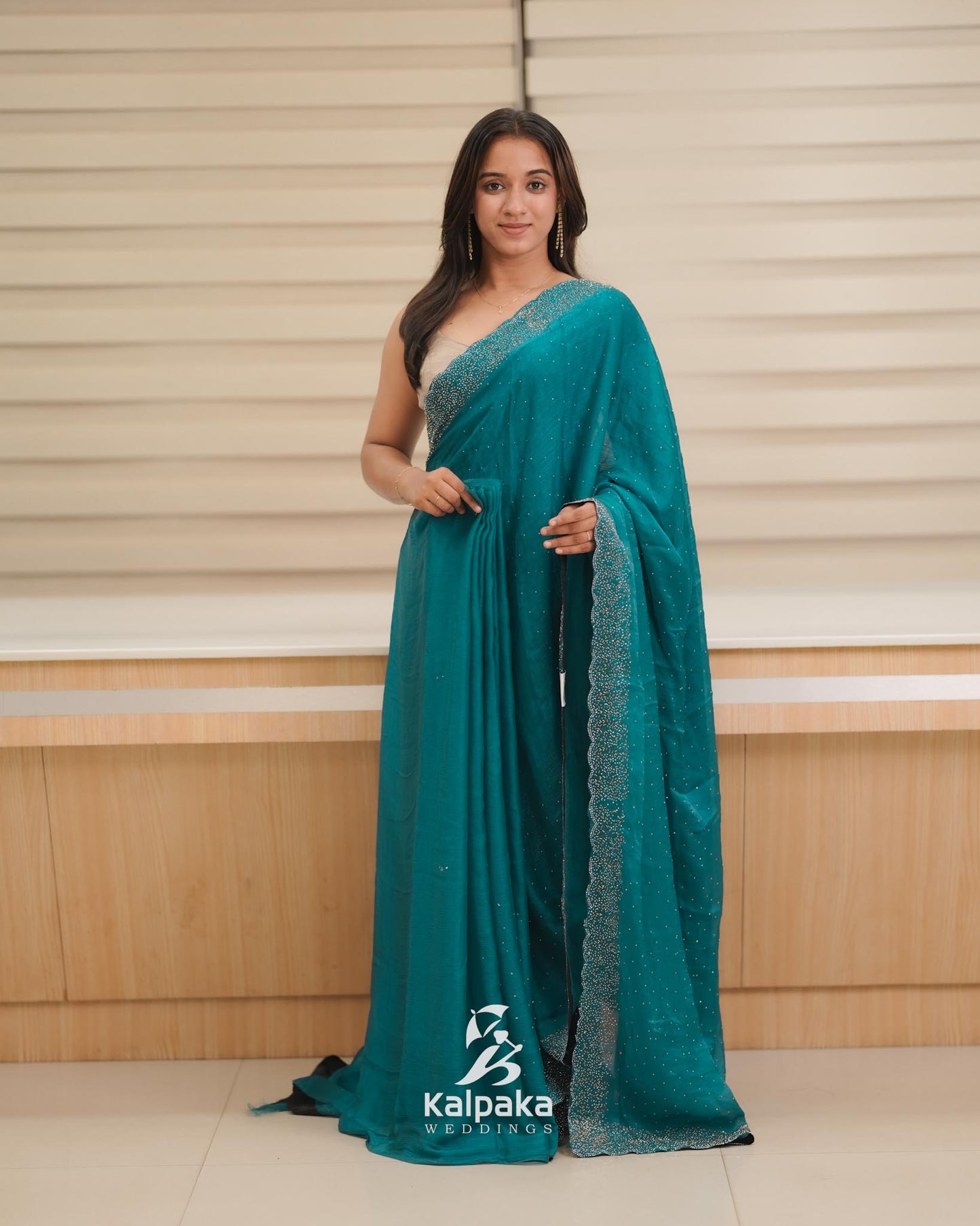 Peacock blue Fancy Saree with Stone Work Border 🌸